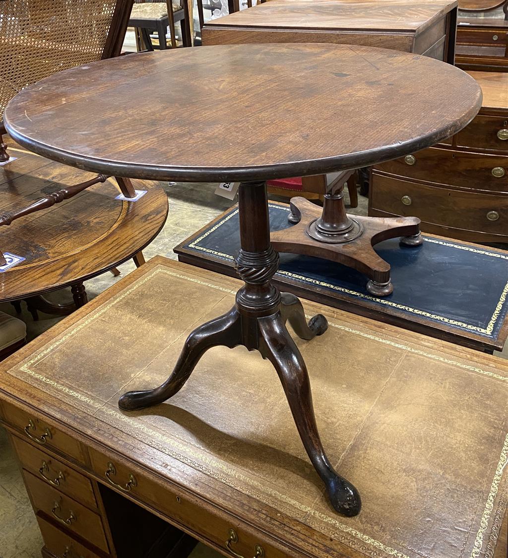 A George III mahogany circular tilt top birdcage tea table, 75cm diameter, height 70cm